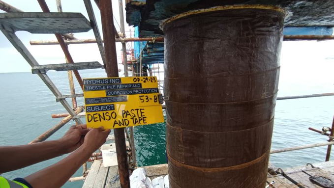 Trestle Pile Repair - Application of Petrolatum Paste and Tape